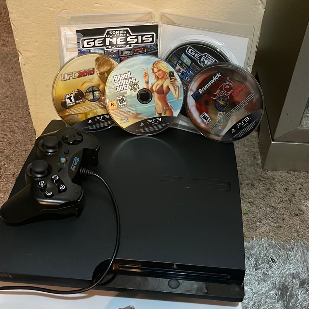 Black PS3 with 4 games